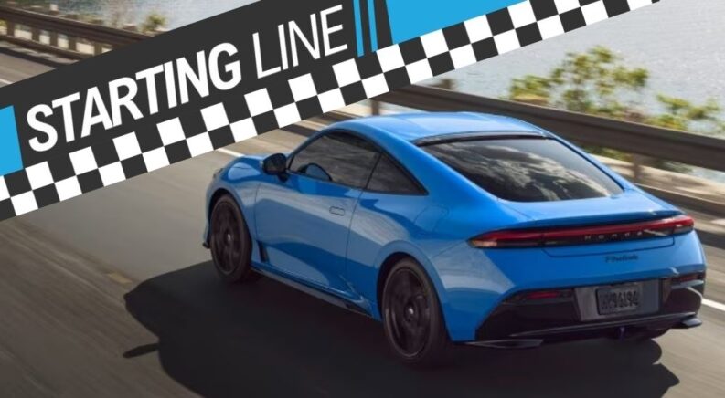 Blue 2026 Honda Prelude driving on a highway
