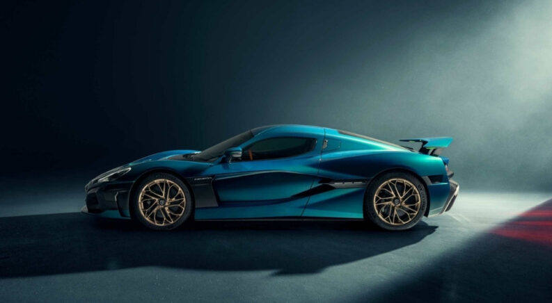 A blue 2025 Rimac Nevera from the side.