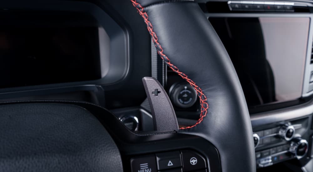 Close-up of the paddle shifter on a steering wheel