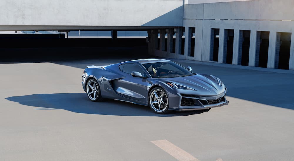 A blue 2025 Chevy Corvette E-Ray from the front.