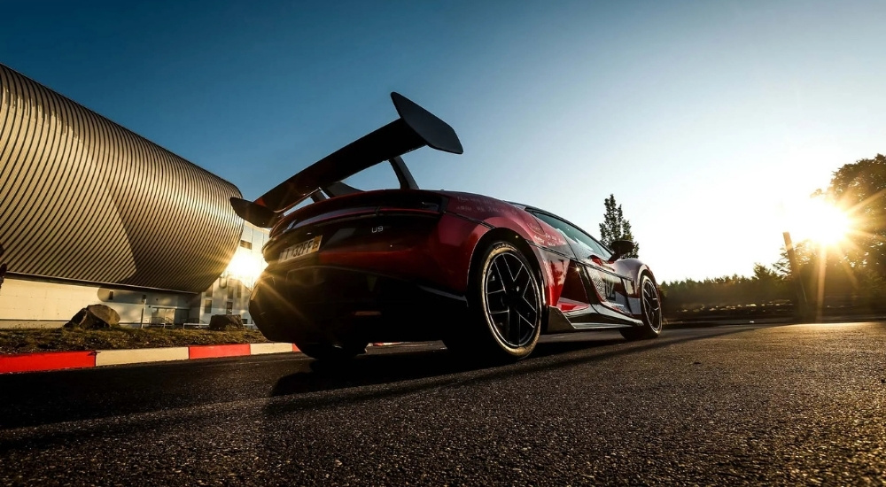 A red YANGWANG U9 Xtreme on a racetrack