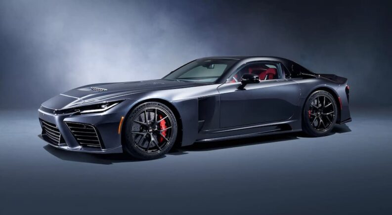 A silver Toyota GR GT in a showroom.