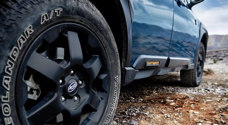 Close-Up of the rim and tire on a blue 2026 Subaru Outback Wilderness