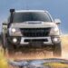 A tan 2022 Chevy Colorado ZR2 Bison Edition is shown off-roading.