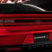 The rear-end of a red 2025 Dodge Charger Daytona.