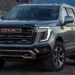 Gray 2025 GMC Yukon AT4 parked off-road