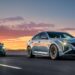 Green and blue 2025 Cadillac V Series driving on highway