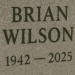 A gravestone with "Brian Wilson1942-2025" engraved on it.