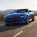 A blue 2024 Nissan Z from the front.