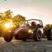 A black and red Ariel Atom parked