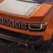 Close-up of the hood on an orange 2026 Jeep Recon EV for sale.