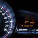 Oil change notification light on a digital gauge cluster