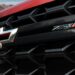Close-up of the grille on a red 2025 Chevy Silverado 2500 ZR2.