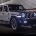 Silver 2023 Jeep Gladiator driving through a tunnel