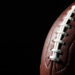 Football against a black background