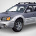 Grey 2002 Subaru Baja with a light grey background